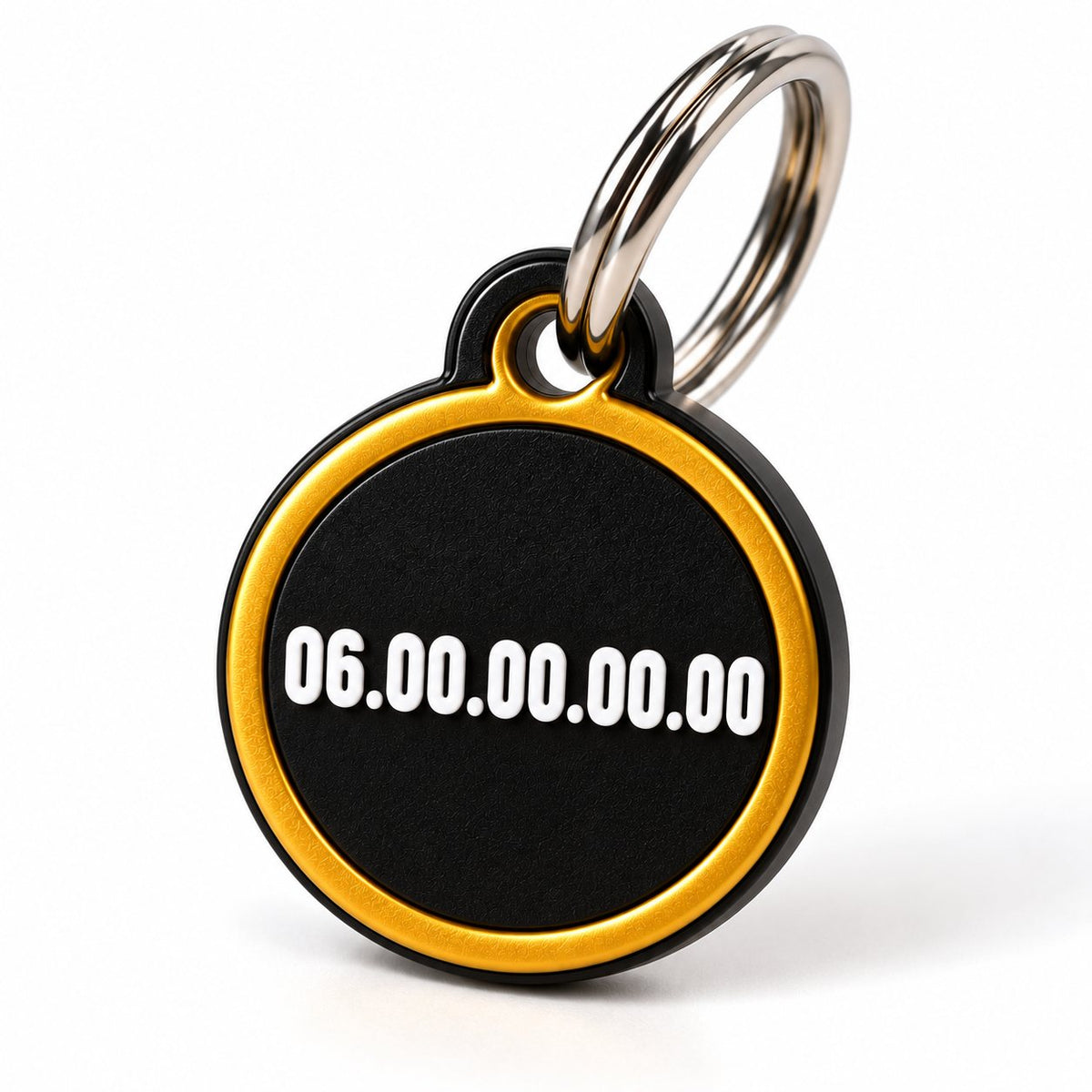 Dos d'une médaille PAW3D ronde dorée avec le numéro de téléphone au format 06.00.00.00.00